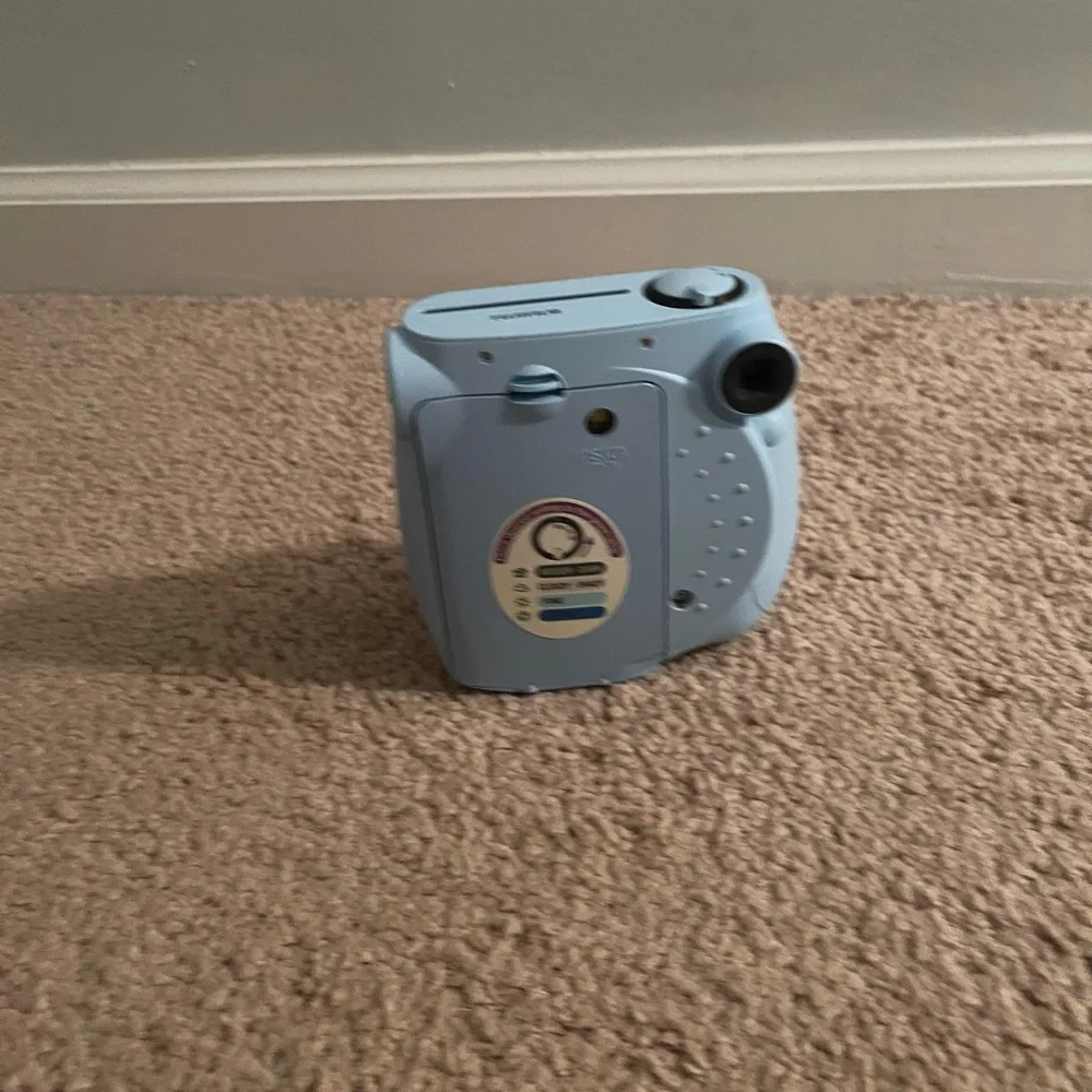 Fujifilm Polaroid Camera- Light blue instax mini 7S and green case